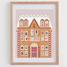 a cross stitch pattern of a gingerbread house with candy canes on the windows