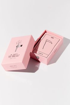 the pink box is open to reveal an empty package