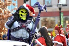 a group of people in costume walking down the street