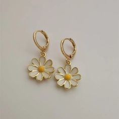 Dainty Hoop Earrings With Flower Charm, Delicate Flower Charm Hoop Earrings, Summer Flower Charm Hoop Earrings, Delicate Flower Shaped Hoop Earrings, Delicate Flower-shaped Hoop Earrings, Trendy Hoop Earrings With Flower Charm For Spring, Dainty Spring Flower Earrings For Pierced Ears, Spring Hoop Earrings With Flower Charm, Daisy Flower Earrings For Spring