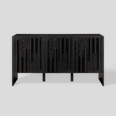 the sideboard is made out of black wood