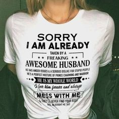 a woman wearing a t - shirt that says sorry i am already