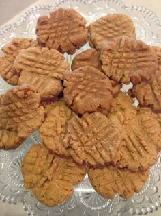 some cookies are sitting on a glass plate