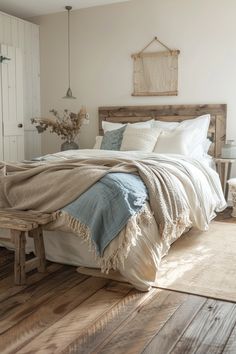 a bed sitting on top of a wooden floor