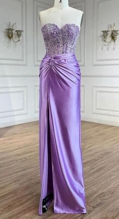 Made to Order Stunning Lilac Strapless Beaded Sweetheart Neck Corset Gathered Satin Gown. If you're looking for that unique sparkly statement piece, you have found it!  Production time is between approx 6-8 weeks. * Sizing - All items are made according to measurement ranges, they are NOT typical letter or numeric sizing. It is imperative to compare your exact measurements with the size chart provided either in the listing photos or item descriptions and to also add your measurements under Personalization. If you have any questions on sizing, please feel free to message me. Do not order your normal size without taking and comparing measurements. * Made to order items such as feather tops, jackets, dresses and rhinestone/crystal dresses are NON-REFUNDABLE/EXCHANGEABLE. If you have a problem Purple Embellished Evening Dress With Sweetheart Neckline, Crystal Dresses, Satin Long Prom Dress, Neck Corset, Navy Blue Prom Dresses, Prom Dress Shoes, Black Homecoming Dress, Crystal Dress, White Homecoming Dresses