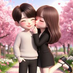 two people are kissing in front of pink flowers