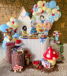 a birthday party with balloons and decorations