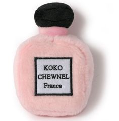 a small pink bottle with a black cap on it's top that says koko chevinel france