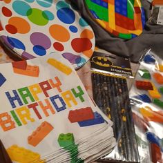 the birthday party supplies are laid out on the table