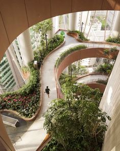 an overhead view of a building with plants growing on the walls and walkway leading up to it