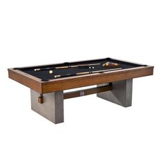 a pool table with two cues and one ball resting on the top, in front of a white background