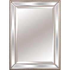 a silver framed mirror with beading around the edges and an ornate border on top