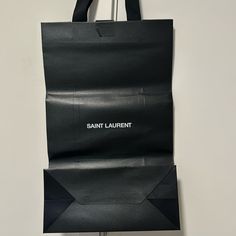 Brand New Black Saint Laurent Jumbo Paper Shopping Bag. Nwot Smoke /Pet Free, 100% Authentic Saint Laurent Tote, Saint Laurent Sunglasses, Bow Heels, Saint Laurent Shoes, Ankle Strap Sandals, Shoe Box, Strap Sandals, Paper Shopping Bag, New Black