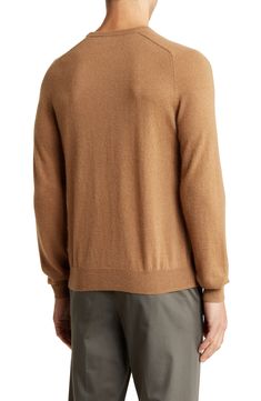 Knit from camel hair, this timeless crewneck sweater is featured in a solid hue for easy, everyday pairing. Crewneck Long sleeves 100% camel hair Dry clean Imported Classic Brown Sweater For Layering, Classic Crew Neck Polo Sweater For Layering, Classic Brown Polo Sweater With Crew Neck, Classic Brown Sweater With Ribbed Collar, Casual Brown Crew Neck Polo Sweater, Casual Camel Long Sleeve Sweater, Casual Brown Cashmere Top, Beige Crew Neck Polo Sweater, Classic Brown Turtleneck Top