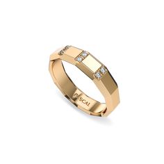 a gold ring with diamonds on it