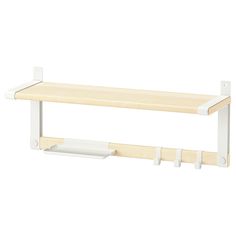 a wooden shelf with two white brackets on the top and one is attached to it