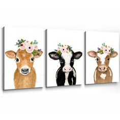 three pictures of cows with flowers on their heads are hanging in front of a fireplace