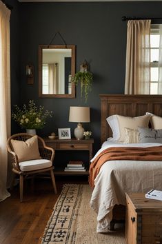 a bed room with a neatly made bed and a mirror on the wall above it