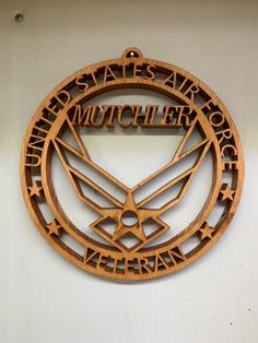 a wooden sign that says, united states air force mutcher veteran on it