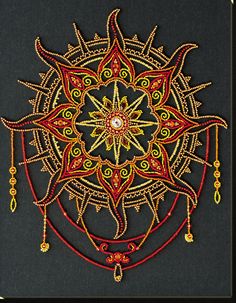 an intricate design made with beads and thread