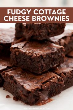 fudgey cottage cheese brownies stacked on top of each other with text overlay