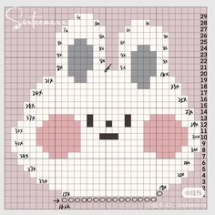 a cross stitch pattern with an image of a white cat on it's face