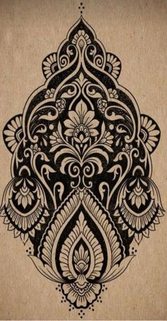 an intricately designed drawing on brown paper with black and white ink, in the shape of a flower