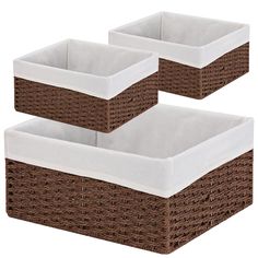 two brown wicker baskets with white liners