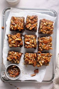 pecan nut brownies on a baking sheet