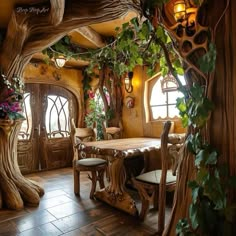 the dining room is made out of wood and has plants growing on the walls, along with potted plants