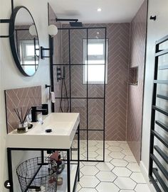 a bathroom with a sink, mirror and shower stall in the middle of the room