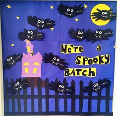 we're a spooky batch bulletin board made with construction paper and cut outs