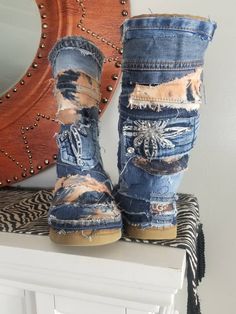 I covered a pair of gently worn authentic ugg boots with distressed orange tie-dye denim. These boots have little to no wear. Like new. I have several pairs of gently worn ugg boots in different sizes I can cover. Boots will be same basic design but pockets may vary and color of tie dye may vary due to lighting but I try to get as close as possible. Please message me for details. You may also send me boots you already own to customize in any color or style you desire. BE BOLD! BE DIFFERENT! MAKE Blue Jean Boots, Cover Boots, Jean Boots, Blue Jean Purses, Patchwork Boots, Denim Earrings, Jean Purses, Denim Clutch, Orange Tie Dye