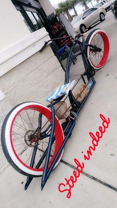 an old fashioned bicycle is parked on the sidewalk