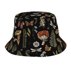 a black bucket hat with flowers and butterflies on the front, and an orange mushroom in the center