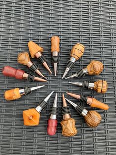 a group of wooden objects sitting on top of a metal table next to each other