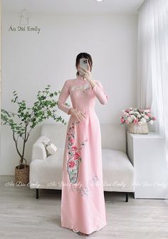 🌻Material: Lụa vân gỗ 🌻Stretchy level: 2/10 🌻 The measurement of this ao dai (long dress) is in Vietnamese size (American size tends to be bigger for the same size). Please LOOK AT THE SIZE CHART CAREFULLY BEFORE ORDERING. There might have some chalk writings on the fabric due to making process. These marks can be washed away easily. 🌻🌻No returns or exchanges Buyer can contact seller about any issues with an order. 🌸 Follow us Facebook/aodaiemily www.aodaiemily.com 💜 Thank you very much💜 Elegant Pink Ao Dai With Floral Embroidery, Elegant Ao Dai With Floral Embroidery For Spring, Pink Ao Dai With Floral Embroidery For Wedding, Wedding Ao Dai In Pink With Floral Embroidery, Wedding Ao Dai With Pink Floral Embroidery, Wedding Pink Ao Dai With Floral Embroidery, Spring Wedding Ao Dai With Floral Print, Elegant Long Sleeve Cheongsam With Floral Embroidery, Full Length Spring Dress With Floral Embroidery