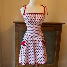 Vintage Betsey Johnson Red Polka Dot Dress Elasticised At The Waist Panel-Stretchy 2 Pockets With Bows! Built In Slip (Pic 7) Dress And Slip 100% Cotton Apx. Measurements Laying Flat: Waist: 11.75" Length: 26.5" Bust: 14" (Up To 17", Plus Extra Stretch And Room In Pleated Material For Bust) 90s Betsey Johnson Dress, Summer Sun Dresses, Betsey Johnson Dress, Fashion Bible, Red Polka Dot Dress, Vintage Betsey Johnson, White Polka Dot Dress, Sun Dresses, Betsey Johnson Dresses