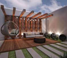 an outdoor living room with wood flooring and stone wall panels on the outside walls