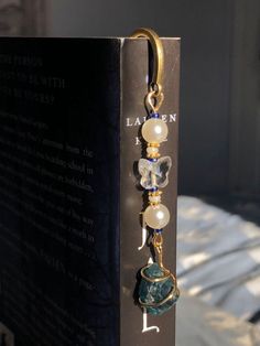 a book with some charms attached to it