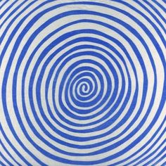 a blue and white circular pattern on fabric