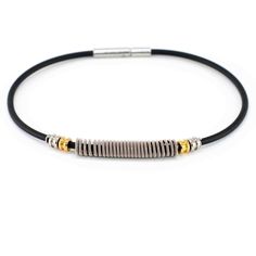 Black electric guitar string bracelet with silver and gold guitar ball ends on white background Modern Adjustable Braided Leather Bracelet, Bar Cords Guitar, Guitar String Ring, Guitar String Bracelet, Guitar String Jewelry, Electric Guitar Strings, Urban Electric, Heart Strings, Simple Pins