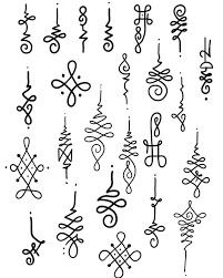 an image of many different symbols in the form of letters and numbers on white paper