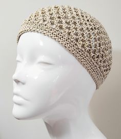 Inspired by the boho chic and disco styles of the 1970's, this pale gold crochet skull cap will put you in the party mood. If you're planning a night out with the girls or going off to a festival, this hat adds a stylish finishing touch to your outfit. Hand crafted with high quality, fine 100% mercerised cotton yarn, this pale gold sparkle skull cap also has a metallic gold thread working throughout the design for extra sparkle.   You can wear this crochet hat as a classic beanie, or to the side Adjustable Lightweight Cream Crochet Hat, Cream Bohemian Crochet Hat With Adjustable Fit, Bohemian Cream Crochet Hat, Bohemian Crochet Lace Hat With Adjustable Fit, Adjustable Bohemian Crochet Lace Hat, Adjustable Beige Cotton Yarn Crochet Hat, Adjustable Beige Crochet Cotton Hat, Adjustable Beige Crochet Hat In Cotton Yarn, Bohemian Cream Crochet Hat One Size