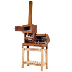 a wooden stove sitting on top of a table next to a shelf filled with wood