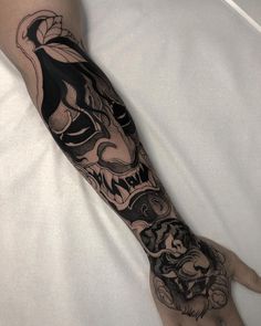 a person with a tattoo on their arm