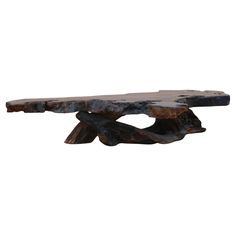 a wooden bench made out of logs on a white background with no people around it