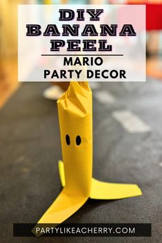 an origami banana paper party decoration with the words diy banana peel mario party decor