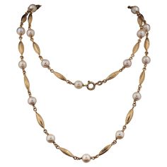 Unique Pearl Soutoir This extremely charming long soutoir necklace dates 1930/35 ca It is beautifully made by alternated cultured Pearl and solids gold links with lovely geometric decorations for a truly charming and effective result Marked for gold 18 KT Pearls are 22 in number, round in shape 7 – 7,5 mm. in size lustrous white cream colour hand mounted and linked with the gold sections, each gold link is links are 20 x 5mm. (h. x w.) without the gold connections Very wearable alone or with oth Elegant Necklace With Oval Link Pearl Chain, Art Deco Yellow Gold Necklace For Formal Occasions, Antique Formal Pearl Chain Necklace, Antique Pearl Chain Jewelry For Formal Occasions, Antique Pearl Chain Necklace For Formal Occasions, Classic Evening Chain Necklace, Vintage Oval Link Formal Necklace, Vintage Oval Link Formal Necklaces, Vintage Oval Link Necklace For Formal Occasions