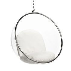 a hanging chair with a white cushion in the shape of a circle on a chain